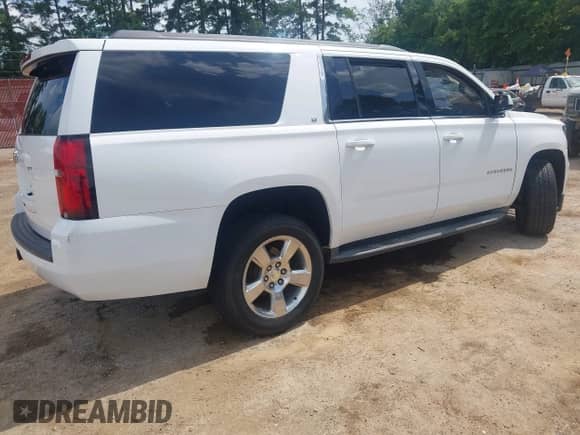 2015 Chevrolet Suburban LT z VIN 1GNSCJKC4FR298108, wystawiony jako IAAI lot #42649373 z przebiegiem 150 155 mil mil oraz . Historia ofert i sprzedaży dostępna na DreamBid. Obrazek 4.