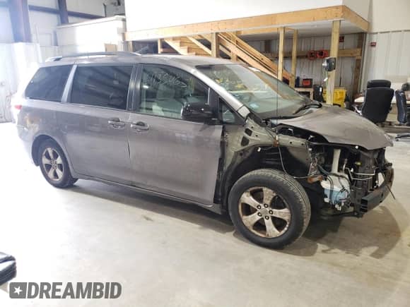 2011 Toyota Sienna LE with VIN 5TDKK3DC1BS033095, listed as a Copart auction lot 61135465 with 317,340 mi miles and Clean title. Bid and sale history available at DreamBid. Image 4.