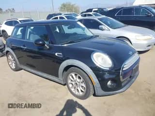 2014 MINI Hardtop with VIN WMWXM5C53ET934731, listed as a IAAI auction lot 43345367 with 48,628 mi miles and . Bid and sale history available at DreamBid. Image 1.