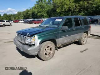1998 Jeep Grand Cherokee Laredo с VIN 1J4GZ58S3WC291182, выставлен на аукционе Copart как лот 69660545 с пробегом 138 804 миль миль и Списание • Salvage title. История ставок и продаж доступна на DreamBid. Изображение 1.