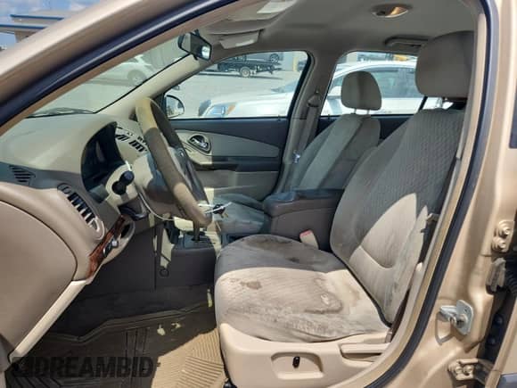 2004 Chevrolet Malibu z VIN 1G1ZS52F74F145953, wystawiony jako Copart lot #65617255 z przebiegiem 383 938 mil mil oraz Szkoda całkowita • Salvage title. Historia ofert i sprzedaży dostępna na DreamBid. Obrazek 7.