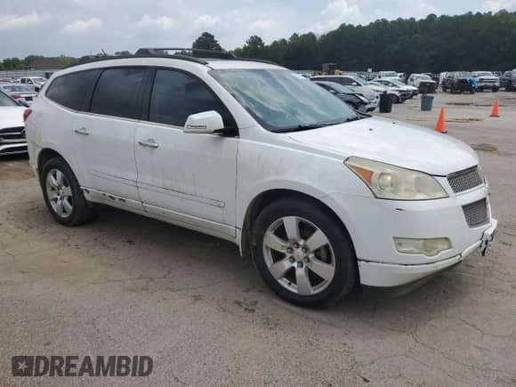 2009 Chevrolet Traverse LTZ z VIN 1GNER33D39S155758, wystawiony jako Copart lot #62319575 z przebiegiem 144 405 mil mil oraz Szkoda całkowita • Salvage title. Historia ofert i sprzedaży dostępna na DreamBid. Obrazek 4.