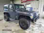 2001 Jeep Wrangler SE with VIN 1J4FA29P11P358326, listed as a Copart auction lot 56181715 with 201,929 mi miles and Clean title. Bid and sale history available at DreamBid. Image 4.