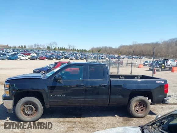 2015 Chevrolet Silverado 1500 LT z VIN 1GCVKREH5FZ351980, wystawiony jako IAAI lot #41992041 z przebiegiem 122 709 mil mil oraz . Historia ofert i sprzedaży dostępna na DreamBid. Obrazek 14.