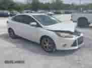 2013 Ford Focus Titanium with VIN 1FADP3J26DL112486, listed as a IAAI auction lot 43365520 with 223,173 mi miles and . Bid and sale history available at DreamBid. Image 1.