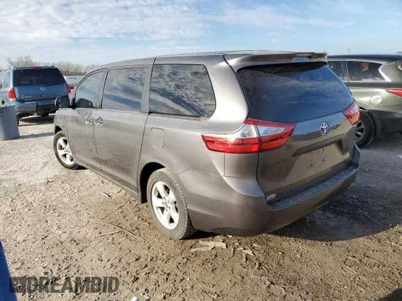 2018 Toyota Sienna L with VIN 5TDZZ3DCXJS931025, listed as a Copart auction lot 49206645 with 141,125 mi miles and Clean title. Bid and sale history available at DreamBid. Image 2.