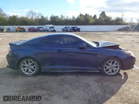 2008 Hyundai Tiburon GT with VIN KMHHN66F88U278938, listed as a IAAI auction lot 41490527 with 200,669 mi miles and . Bid and sale history available at DreamBid. Image 13.