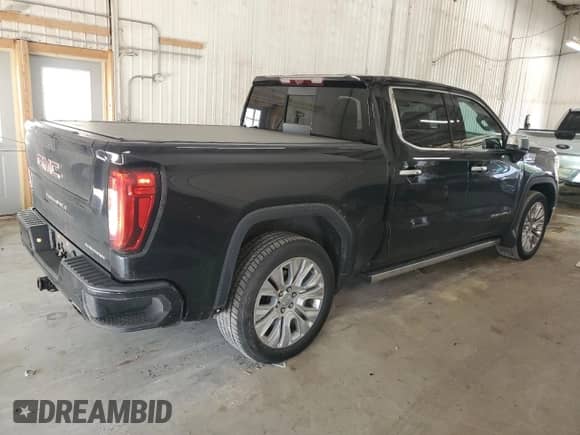 2020 GMC Sierra 1500 Denali z VIN 3GTU9FEL2LG395019, wystawiony jako Copart lot #64131135 z przebiegiem 68 996 mil mil oraz Szkoda całkowita • Salvage title. Historia ofert i sprzedaży dostępna na DreamBid. Obrazek 3.