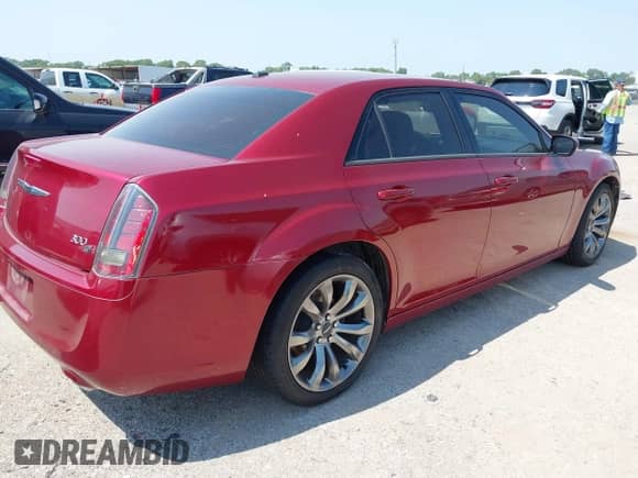 2014 Chrysler 300 S with VIN 2C3CCABG8EH261016, listed as a IAAI auction lot 43174042 with 123,895 mi miles and . Bid and sale history available at DreamBid. Image 4.