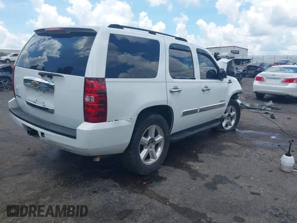 2007 Chevrolet Tahoe LS with VIN 1GNFC13C87J264964, listed as a IAAI auction lot 42640675 with Not provided miles and . Bid and sale history available at DreamBid. Image 4.