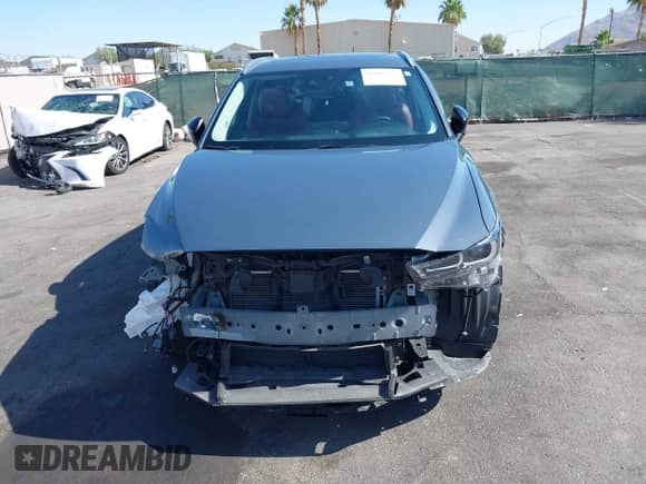 2022 Mazda CX-5 S Preferred z VIN JM3KFBCM2N1565165, wystawiony jako IAAI lot #42507203 z przebiegiem 39 853 mil mil oraz . Historia ofert i sprzedaży dostępna na DreamBid. Obrazek 13.