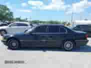 1997 BMW 7 Series 740i with VIN WBAGF8325VDL45398, listed as a IAAI auction lot 41910072 with 174,590 mi miles and . Bid and sale history available at DreamBid. Image 14.