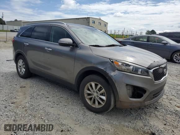 2016 Kia Sorento L with VIN 5XYPG4A30GG128818, listed as a Copart auction lot 61006175 with Not provided miles and Clean title. Bid and sale history available at DreamBid. Image 4.