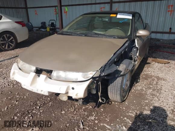 1997 Saturn 2dr Coupe with VIN 1G8ZH127XVZ333643, listed as a IAAI auction lot 42463504 with 104,295 mi miles and . Bid and sale history available at DreamBid. Image 17.