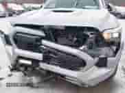 2024 Toyota Tacoma SR5 with VIN 3TMLB5JN6RM018639, listed as a IAAI auction lot 41251861 with 10,088 mi miles and . Bid and sale history available at DreamBid. Image 6.