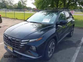 2023 Hyundai Tucson SEL z VIN 5NMJFCAE7PH208501, wystawiony jako IAAI lot #42915448 z przebiegiem 12 068 mil mil oraz . Historia ofert i sprzedaży dostępna na DreamBid. Obrazek 2.