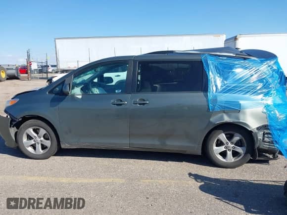 2012 Toyota Sienna LE AAS with VIN 5TDKK3DC6CS209348, listed as a IAAI auction lot 43310459 with Not provided miles and . Bid and sale history available at DreamBid. Image 14.