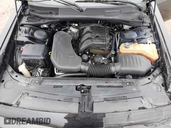 2012 Dodge Challenger SXT с VIN 2C3CDYAG8CH196303, выставлен на аукционе Copart как лот 90491975 с пробегом 126 383 миль миль и Чистый • Clean title. История ставок и продаж доступна на DreamBid. Изображение 11.