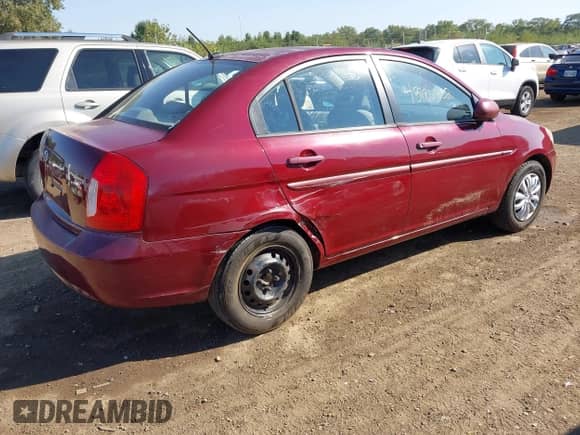 2011 Hyundai Accent GLS z VIN KMHCN4AC0BU574054, wystawiony jako IAAI lot #43186432 z przebiegiem 205 376 mil mil oraz . Historia ofert i sprzedaży dostępna na DreamBid. Obrazek 4.