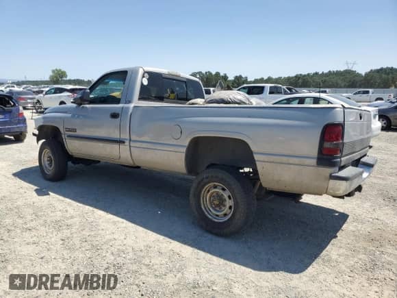2000 Dodge 2500 with VIN 3B7KF2665YM215073, listed as a Copart auction lot 59399015 with 264,074 mi miles and Salvage title. Bid and sale history available at DreamBid. Image 2.