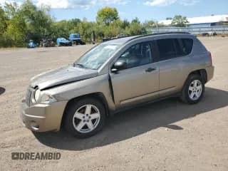 2007 Jeep Compass Sport with VIN 1J8FF47W17D261059, listed as a Copart auction lot 71226105 with 144,242 mi miles and Salvage title. Bid and sale history available at DreamBid. Image 1.