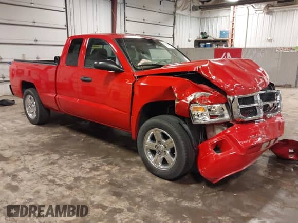2008 Dodge Dakota SLT with VIN 1D7HW42K78S520323, listed as a IAAI auction lot 42643266 with 200,945 mi miles and . Bid and sale history available at DreamBid. Image 1.
