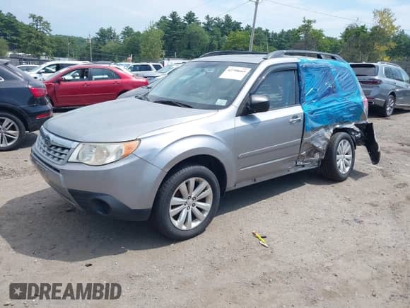 2011 Subaru Forester X Premium with VIN JF2SHADC1BG753804, listed as a IAAI auction lot 42798669 with 145,706 mi miles and . Bid and sale history available at DreamBid. Image 2.