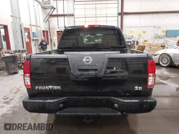 2009 Nissan Frontier SE with VIN 1N6AD07U59C401327, listed as a IAAI auction lot 41591067 with 203,043 mi miles and . Bid and sale history available at DreamBid. Image 16.