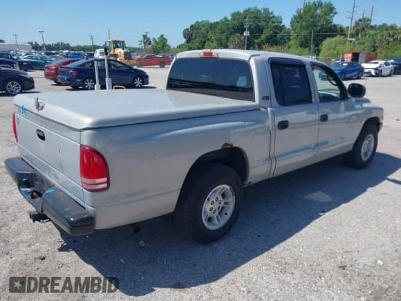 2000 Dodge Dakota Sport with VIN 1B7GL2AX6YS644891, listed as a IAAI auction lot 41961323 with 194,210 mi miles and . Bid and sale history available at DreamBid. Image 4.