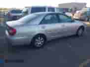 2003 Toyota Camry LE with VIN JTDBE32K130187036, listed as a IAAI auction lot 43504391 with 205,170 mi miles and . Bid and sale history available at DreamBid. Image 4.