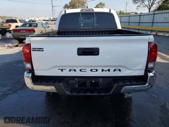 2020 Toyota Tacoma SR with VIN 5TFAX5GN3LX165499, listed as a Copart auction lot 84973885 with 67,043 mi miles and Salvage title. Bid and sale history available at DreamBid. Image 6.