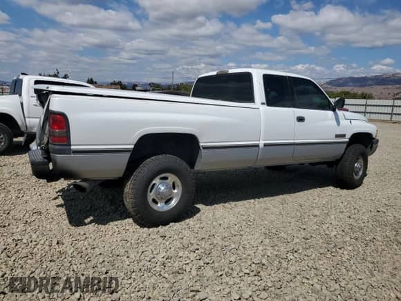 1996 Dodge 2500 with VIN 1B7KF23CXTJ157588, listed as a Copart auction lot 80147545 with 293,741 mi miles and Salvage title. Bid and sale history available at DreamBid. Image 3.