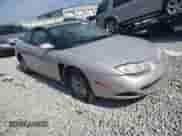 2001 Saturn SC with VIN 1G8ZR12711Z109068, listed as a Copart auction lot 72353914 with 116,559 mi miles and Salvage title. Bid and sale history available at DreamBid. Image 4.