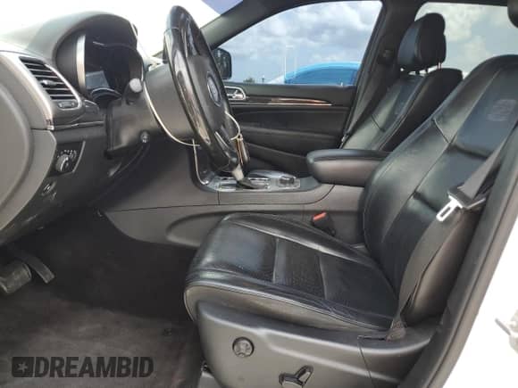 2018 Jeep Grand Cherokee High Altitude with VIN 1C4RJFCT1JC452696, listed as a Copart auction lot 62885035 with 112,998 mi miles and Salvage title. Bid and sale history available at DreamBid. Image 7.
