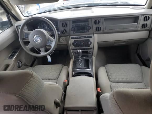 2006 Jeep Commander z VIN 1J8HG48K56C104463, wystawiony jako Copart lot #67740515 z przebiegiem 100 019 mil mil oraz Szkoda całkowita • Salvage title. Historia ofert i sprzedaży dostępna na DreamBid. Obrazek 8.