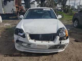 2004 Hyundai Accent GL с VIN KMHCG35C64U312248, выставлен на аукционе Copart как лот 79622234 с пробегом 107 594 миль миль и Списание • Salvage title. История ставок и продаж доступна на DreamBid. Изображение 5.