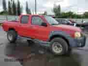 2001 Nissan Frontier SE with VIN 1N6ED27T71C314764, listed as a Copart auction lot 86176435 with Not provided miles and Salvage title. Bid and sale history available at DreamBid. Image 4.