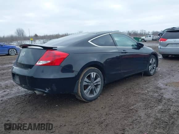 2011 Honda Accord EX with VIN 1HGCS1B70BA013174, listed as a IAAI auction lot 41604372 with 169,498 mi miles and . Bid and sale history available at DreamBid. Image 4.