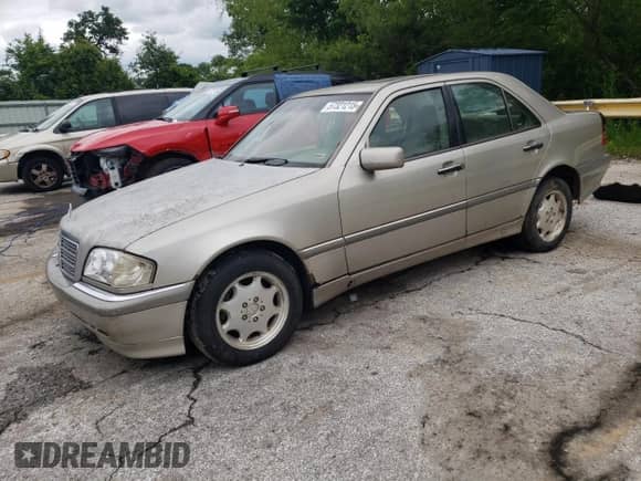 1998 Mercedes-Benz C 230/260/280/320 with VIN WDBHA29G7WA570798, listed as a Copart auction lot 57321215 with 102,406 mi miles and Clean title. Bid and sale history available at DreamBid. Image 1.