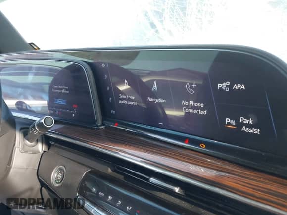 2021 Cadillac Escalade Premium Luxury with VIN 1GYS4BKL3MR396503, listed as a IAAI auction lot 41879069 with 53,728 mi miles and . Bid and sale history available at DreamBid. Image 17.