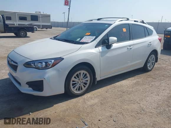 2018 Subaru Impreza Premium with VIN 4S3GTAB63J3733771, listed as a IAAI auction lot 43139944 with 82,357 mi miles and . Bid and sale history available at DreamBid. Image 2.