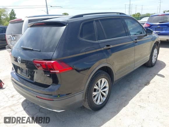 2018 Volkswagen Tiguan S с VIN 3VV1B7AX0JM104698, выставлен на аукционе IAAI как лот 42873240 с пробегом 81 095 миль миль и . История ставок и продаж доступна на DreamBid. Изображение 4.