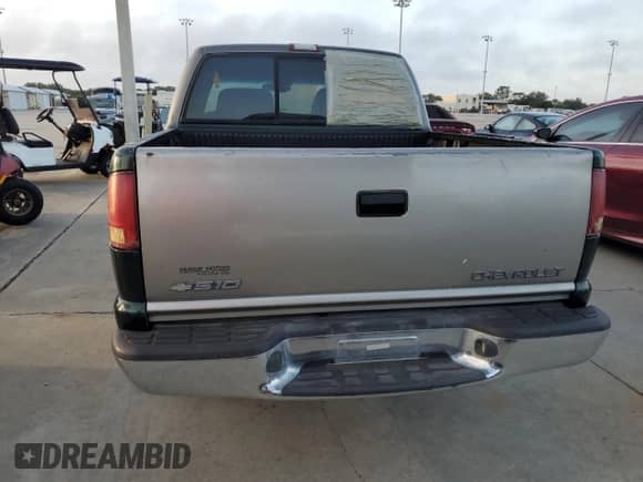 2001 Chevrolet S-10 LS с VIN 1GCDT13W41K219645, выставлен на аукционе Copart как лот 77143144 с пробегом 159 803 миль миль и Списание • Salvage title. История ставок и продаж доступна на DreamBid. Изображение 6.