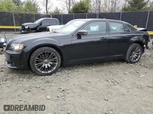 2013 Chrysler 300 C John Varvatos Limited Edition with VIN 2C3CCADT4DH693708, listed as a Copart auction lot 51509575 with 19,819 mi miles and Salvage title. Bid and sale history available at DreamBid. Image 1.