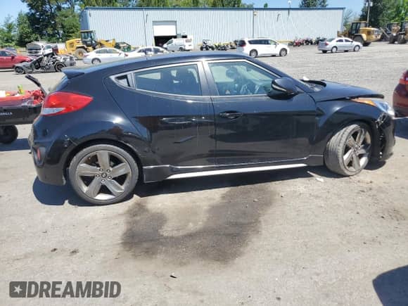 2014 Hyundai Veloster Turbo R-Spec с VIN KMHTC6AE0EU191187, выставлен на аукционе Copart как лот 65017625 с пробегом 134 079 миль миль и Списание • Salvage title. История ставок и продаж доступна на DreamBid. Изображение 3.