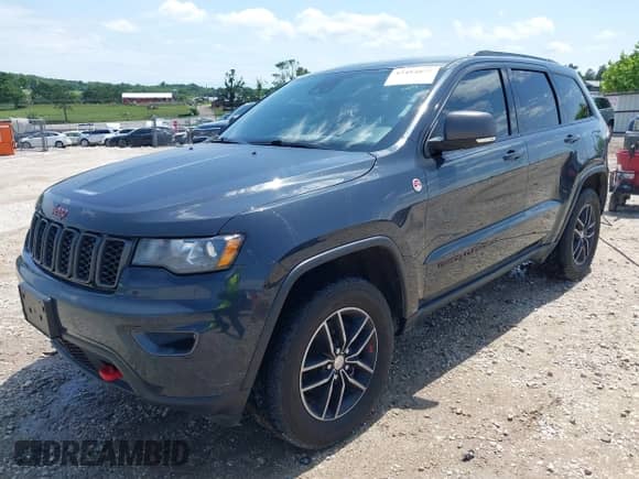 2018 Jeep Grand Cherokee Trailhawk z VIN 1C4RJFLG7JC418832, wystawiony jako IAAI lot #42484877 z przebiegiem 139 331 mil mil oraz . Historia ofert i sprzedaży dostępna na DreamBid. Obrazek 18.
