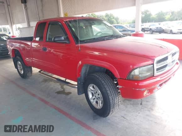 2004 Dodge Dakota SLT с VIN 1D7HG42NX4S734157, выставлен на аукционе IAAI как лот 42608987 с пробегом 148 141 миль миль и . История ставок и продаж доступна на DreamBid. Изображение 1.