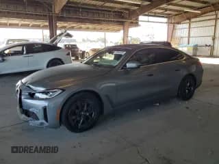 2024 BMW i4 eDrive35 with VIN WBY43AW05RFS37971, listed as a Copart auction lot 70945365 with 40,946 mi miles and Salvage title. Bid and sale history available at DreamBid. Image 1.