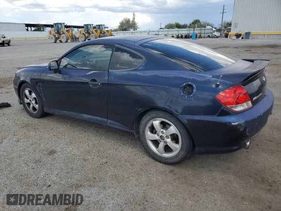 2006 Hyundai Tiburon GS с VIN KMHHM65D26U218704, выставлен на аукционе Copart как лот 80553255 с пробегом 211 718 миль миль и Списание • Salvage title. История ставок и продаж доступна на DreamBid. Изображение 2.