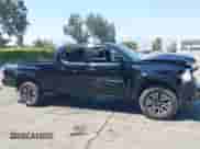 2023 Toyota Tacoma SR5 z VIN 3TMDZ5BN7PM148621, wystawiony jako IAAI lot #42928723 z przebiegiem 70 708 mil mil oraz . Historia ofert i sprzedaży dostępna na DreamBid. Obrazek 13.